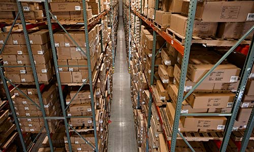 Very Narrow Aisle Warehouse with Raymond Swing-Reach Turret Truck